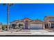 Charming single-Gathering home with a two car garage and desert landscaping at 17617 W Corrine Dr, Surprise, AZ 85388