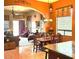 Cozy living room with open dining area, complemented by large windows that flood the space with natural light at 1766 N Channing --, Mesa, AZ 85207