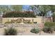 Mountain Bridge community entrance sign surrounded by desert landscaping with lush plants and flowers at 1766 N Channing --, Mesa, AZ 85207