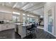 Open concept kitchen with a large island, stainless steel appliances, and access to the outdoor patio at 19947 N 94Th Way, Scottsdale, AZ 85255