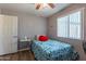 Comfortable bedroom with natural light, bed and closet, creating a cozy and private retreat at 2022 W Aster Dr, Phoenix, AZ 85029