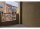 Private balcony overlooking neighboring townhomes in the community at 240 W Juniper Ave # 1211, Gilbert, AZ 85233