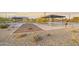 Community park including shaded picnic areas, a playground and green spaces at 24066 W Cocopah St, Buckeye, AZ 85326