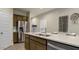 Bright kitchen island with stainless steel appliances and stylish cabinetry at 24066 W Cocopah St, Buckeye, AZ 85326