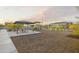Community playground area with picnic benches, playground and sidewalks at 24066 W Cocopah St, Buckeye, AZ 85326