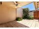 This private patio features ample space for seating and dining, surrounded by lush landscaping at 2442 N 22Nd Ave, Phoenix, AZ 85009