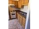 Functional kitchen offers essential appliances and ample cabinetry, perfect for everyday cooking at 2530 W Berridge Ln # E111, Phoenix, AZ 85017