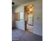 Inviting living room showcases an open design looking into the kitchen area and breakfast bar at 2530 W Berridge Ln # E111, Phoenix, AZ 85017