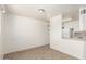 Bright dining area with tile flooring, open to the kitchen at 2802 W Butler Dr, Phoenix, AZ 85051