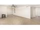 Open-concept living area with tile flooring and easy access to other rooms in the home at 2802 W Butler Dr, Phoenix, AZ 85051