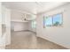 Spacious living room featuring tile flooring, neutral walls, and lots of natural light at 2802 W Butler Dr, Phoenix, AZ 85051