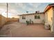 Outdoor patio perfect for entertaining under string lights with views of the yard at 316 N Ironwood --, Mesa, AZ 85201