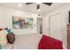 Comfortable bedroom featuring a full bed, closet, and vibrant artwork at 316 N Ironwood --, Mesa, AZ 85201