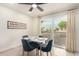 Eat-in kitchen area with table next to sliding glass doors allowing lots of natural light at 316 N Ironwood --, Mesa, AZ 85201