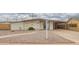 Attractive single-story home with desert landscaping, complemented by a covered carport at 316 N Ironwood --, Mesa, AZ 85201