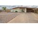 Quaint single-story home with desert landscaping and a spacious carport at 316 N Ironwood --, Mesa, AZ 85201