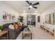 Inviting living room with comfortable seating, neutral tones, and a sliding glass door at 316 N Ironwood --, Mesa, AZ 85201