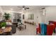 Cozy living room with neutral carpet, contemporary furnishings, and sliding glass doors at 316 N Ironwood --, Mesa, AZ 85201