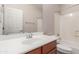 Bathroom featuring a vanity with sink, mirror, and shower-tub at 33512 N 24Th Ln, Phoenix, AZ 85085
