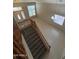 Spacious foyer with staircase, tile flooring, and natural light creating a welcoming entrance at 33512 N 24Th Ln, Phoenix, AZ 85085