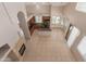 Aerial view of kitchen with stainless steel appliances, island and view of fireplace at 33512 N 24Th Ln, Phoenix, AZ 85085