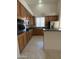 Full kitchen view with ample counter space and modern stainless steel appliances at 33512 N 24Th Ln, Phoenix, AZ 85085