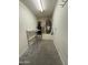 Utility room with water heater, shelving and cement floor at 33512 N 24Th Ln, Phoenix, AZ 85085