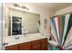 Bathroom with a single vanity, a toilet and a striped shower curtain at 33602 N Cobble Stone Dr, San Tan Valley, AZ 85143