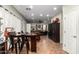 Large dining room featuring neutral tile floors and seamlessly connecting to other living areas for a spacious layout at 33602 N Cobble Stone Dr, San Tan Valley, AZ 85143