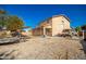 This property features a large backyard with gravel, a trailer, and an oversized SUV at 33602 N Cobble Stone Dr, San Tan Valley, AZ 85143