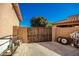 The gate on this property is metal and wood, and surrounded by a block wall at 33602 N Cobble Stone Dr, San Tan Valley, AZ 85143