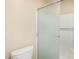 Bathroom featuring a toilet with a glass-enclosed shower at 3500 N Hayden Rd # 710, Scottsdale, AZ 85251