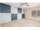 Bright bedroom features modern ceiling fan, neutral carpet, and ample natural light at 3500 N Hayden Rd # 710, Scottsdale, AZ 85251