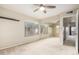 Bedroom with neutral walls, carpet flooring, ceiling fan and mirrored closet doors at 3500 N Hayden Rd # 710, Scottsdale, AZ 85251