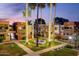 Exterior of the courtyard with benches, a water feature, palm trees and pathways at 3500 N Hayden Rd # 710, Scottsdale, AZ 85251