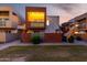 Condo building showcasing a modern design with well-lit balconies and landscaped grounds at 3500 N Hayden Rd # 710, Scottsdale, AZ 85251