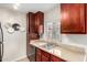 Charming kitchen featuring granite countertops, stainless steel sink, and stylish cabinetry at 3500 N Hayden Rd # 710, Scottsdale, AZ 85251