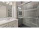 Modern bathroom with a glass-enclosed shower, sleek fixtures, and a bright vanity at 35486 N Morello Dr, Queen Creek, AZ 85140