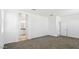 Spacious bedroom with neutral carpet and great natural light at 35941 W San Ildefanso Ave, Maricopa, AZ 85138