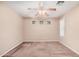Carpeted bedroom with fan, small windows and neutral paint color at 3719 W Carson Rd, Phoenix, AZ 85041