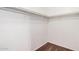 Walk-in closet with hanging racks, carpeted flooring, and white walls at 3719 W Carson Rd, Phoenix, AZ 85041
