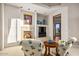 Cozy living room with fireplace and neutral decor at 40635 N 109Th Pl # 3 & 5, Scottsdale, AZ 85262