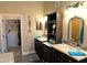 Elegant bathroom with dual vanities, granite countertops, and plenty of storage space at 41215 N Lytham Ct, Phoenix, AZ 85086