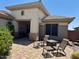 Beautifully landscaped front patio with comfortable seating, perfect for outdoor relaxation at 41215 N Lytham Ct, Phoenix, AZ 85086