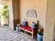 Welcoming front porch with a charming bench and lovely potted plants at 41215 N Lytham Ct, Phoenix, AZ 85086