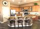 Well-equipped kitchen with granite countertops, stainless steel appliances, and ample cabinet space at 41215 N Lytham Ct, Phoenix, AZ 85086