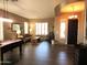 Inviting living room featuring hardwood floors, natural light, and a cozy seating arrangement at 41215 N Lytham Ct, Phoenix, AZ 85086