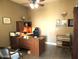 Spacious office features a built in desk and cabinets with ample storage space at 41215 N Lytham Ct, Phoenix, AZ 85086