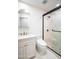 Bathroom with modern vanity, tiled walk-in shower and toilet at 4525 N 66Th St # 95, Scottsdale, AZ 85251