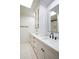 Bright bathroom featuring white cabinetry, marble countertops, and modern fixtures at 4525 N 66Th St # 95, Scottsdale, AZ 85251